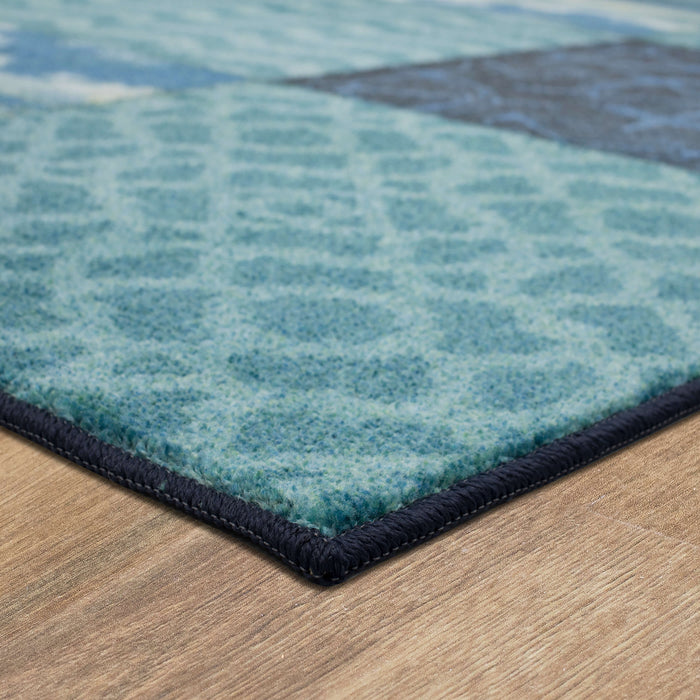 Technicolor Sea Patchwork Blue Area Rug