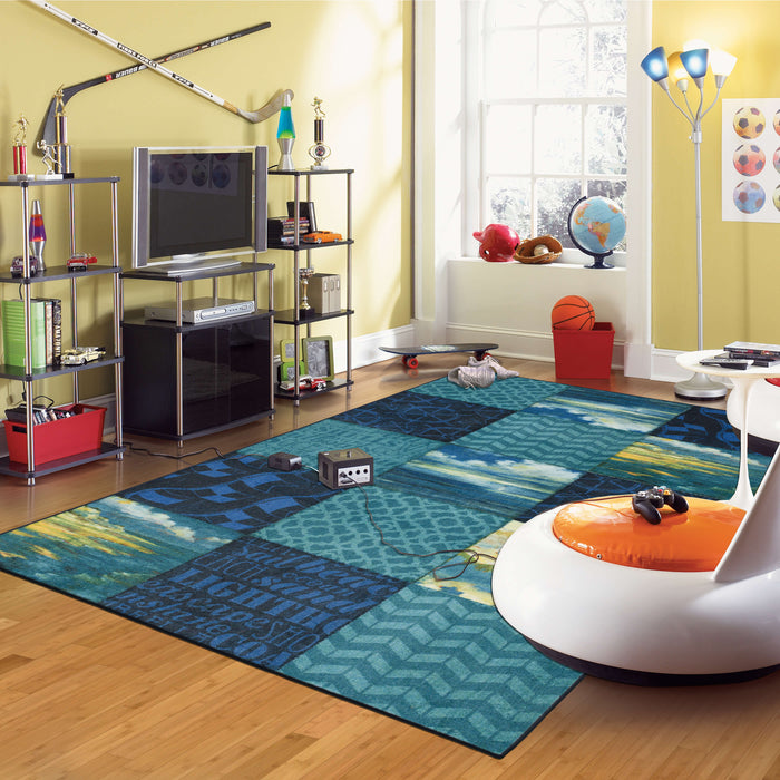 Technicolor Sea Patchwork Blue Area Rug