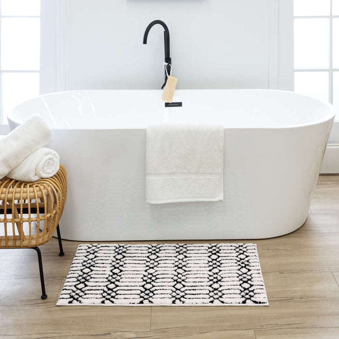 Lewis White and Black Bath Mat Covered By Rugs