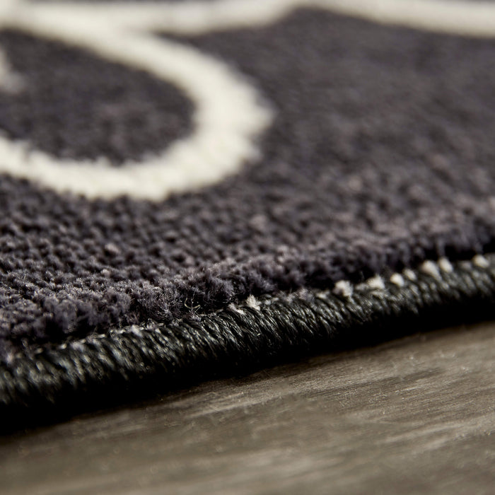 Lucia Calavera Black & White Area Rug