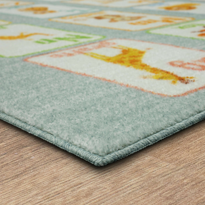 Technicolor ABC Animals Light Blue Area Rug