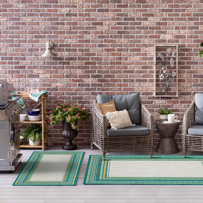 Jackson Geometric Border Teal Area Rug